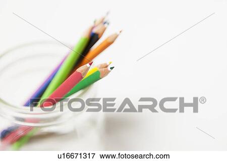 Stock Photo - Close up of colored pencils in jar. Fotosearch