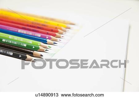 Close up of colored pencils on counter View Large Photo Image Stock Image - Close up of colored pencils on counter. Fotosearch