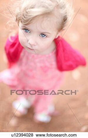 Close up of girls serious face View Large Photo Image Stock Photo - Close up of girls serious face. Fotosearch
