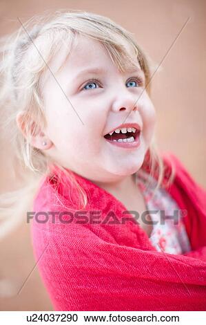 Close up of girls smiling face View Large Photo Image Stock Image - Close up of girls smiling face. Fotosearch
