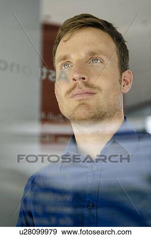 Close up of mans serious face View Large Photo Image Stock Photo - Close up of mans serious face. Fotosearch