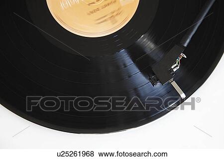 Close up of needle playing record View Large Photo Image Stock Photo - Close up of needle playing record. Fotosearch