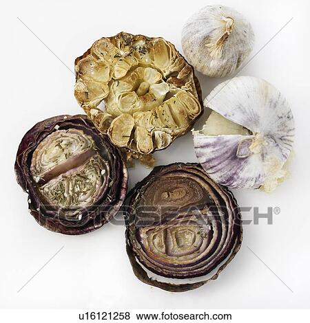 Close up of roasted garlic and onion View Large Photo Image Stock Photo - Close up of roasted garlic and onion. Fotosearch