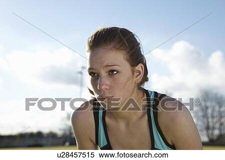 Stock Photography - Close up of runners serious face. Fotosearch