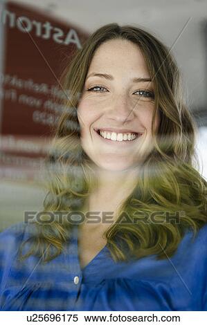 Stock Photography - Close up of womans smiling face. Fotosearch