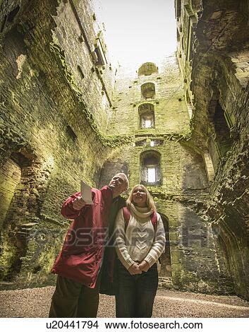 Couple exploring medieval castle View Large Photo Image Picture - Couple exploring medieval castle. Fotosearch