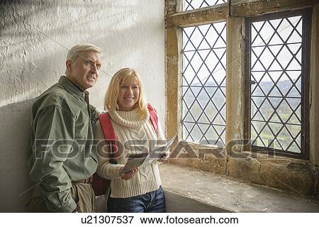 Couple exploring medieval castle View Large Photo Image Stock Photo - Couple exploring medieval castle. Fotosearch