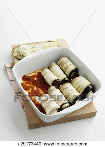 Stock Image - Dish of eggplant canneloni. Fotosearch