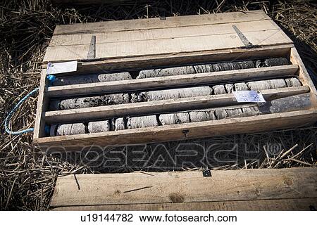 Stock Image - Drill core samples at coal mine. Fotosearch