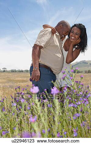 Father and daughter hugging outdoors View Large Photo Image Stock Image - Father and daughter hugging outdoors. Fotosearch
