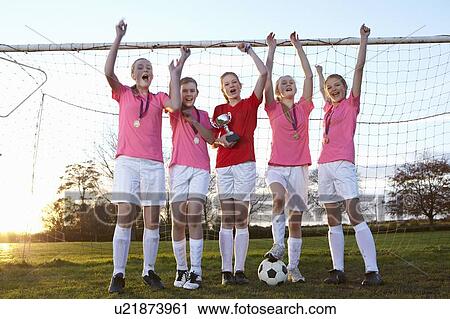 Football team cheering in field View Large Photo Image Stock Image - Football team cheering in field. Fotosearch