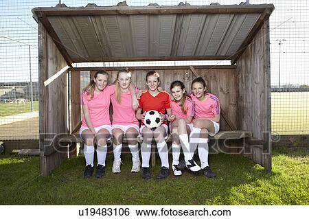 Football team sitting together View Large Photo Image Stock Photograph - Football team sitting together. Fotosearch