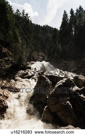 Stock Image - German Alps overlooking rural landscape. Fotosearch