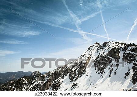 Stock Image - German Alps overlooking rural landscape. Fotosearch
