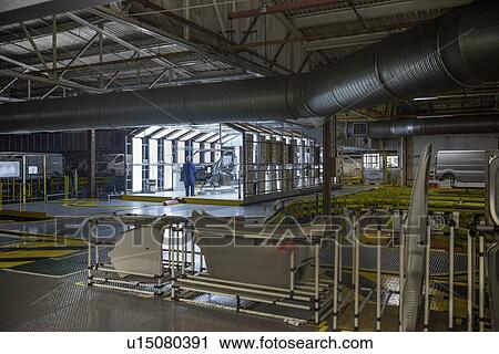 Stock Image - Inspection station in car factory. Fotosearch