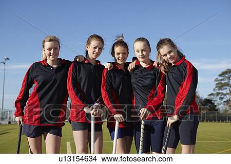 Picture - Lacrosse team smiling together. Fotosearch