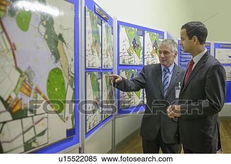Man talking with town hall staff View Large Photo Image Stock Photography - Man talking with town hall staff. Fotosearch