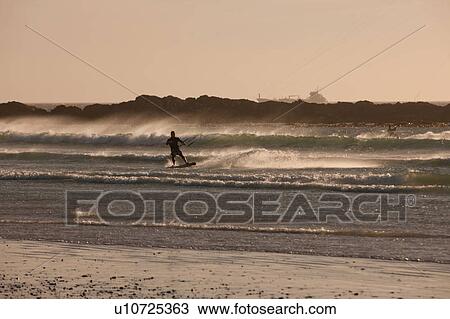 Man windsurfing in waves View Large Photo Image Stock Image - Man windsurfing in waves. Fotosearch