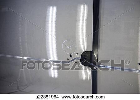 Picture - Marker on car in factory. Fotosearch