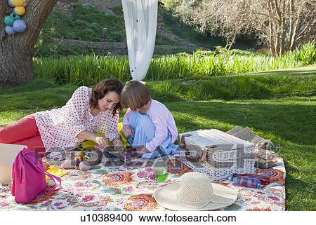 Mother and daughter having picnic View Large Photo Image Stock Image - Mother and daughter having picnic. Fotosearch