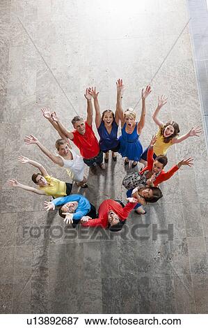 Overhead view of people cheering View Large Photo Image Stock Photo - Overhead view of people cheering. Fotosearch