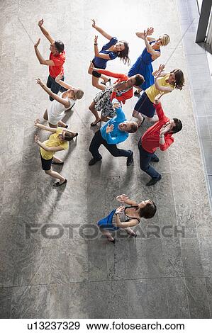 Overhead view of people dancing View Large Photo Image Stock Photo - Overhead view of people dancing. Fotosearch