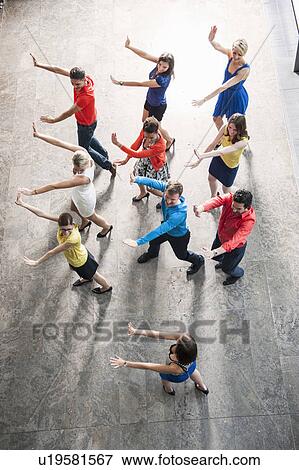 Stock Photo - Overhead view of people dancing. Fotosearch