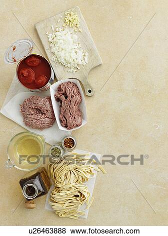 Pasta, tomatoes, meat and spices View Large Photo Image Stock Photo - Pasta, tomatoes, meat and spices. Fotosearch