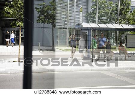 People waiting at bus stop View Large Photo Image Stock Photo - People waiting at bus stop. Fotosearch