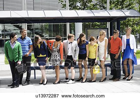 People waiting at bus stop View Large Photo Image Stock Photo - People waiting at bus stop. Fotosearch