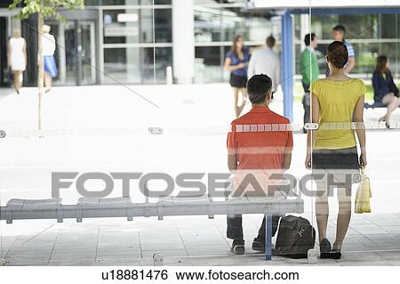 People waiting at bus stop View Large Photo Image Stock Photograph - People waiting at bus stop. Fotosearch