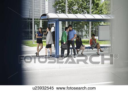 People waiting at bus stop View Large Photo Image Stock Photography - People waiting at bus stop. Fotosearch