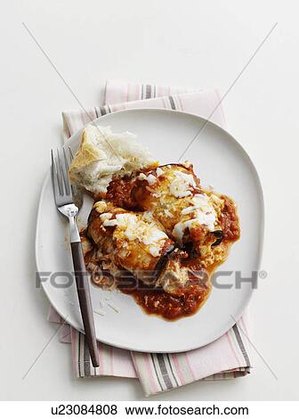 Plate of eggplant canneloni View Large Photo Image Stock Photo - Plate of eggplant canneloni. Fotosearch