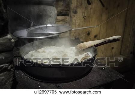 Stock Photography - Pot of stew cooking on stove. Fotosearch