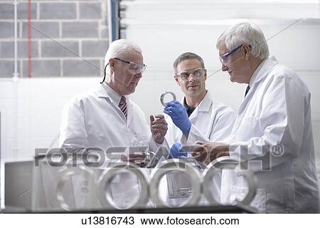 Scientists cleaning with ultrasonics View Large Photo Image Stock Image - Scientists cleaning with ultrasonics. Fotosearch