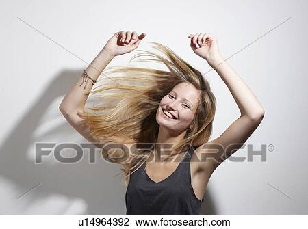 Smiling woman dancing View Large Photo Image Stock Image - Smiling woman dancing . Fotosearch