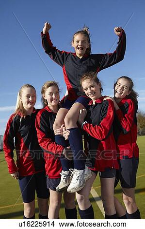 Sports team cheering together View Large Photo Image Picture - Sports team cheering together. Fotosearch
