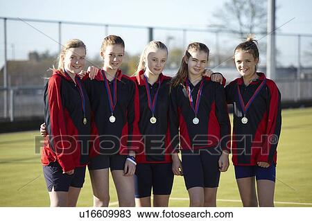 Sports team wearing medals View Large Photo Image Stock Image - Sports team wearing medals. Fotosearch