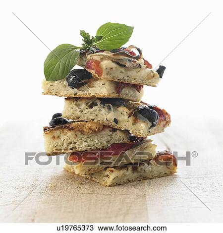 Stock Image - Stack of flatbread pizzas. Fotosearch