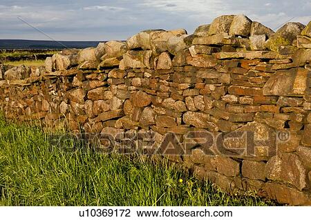 Stone wall in rural landscape View Large Photo Image Stock Image - Stone wall in rural landscape. Fotosearch