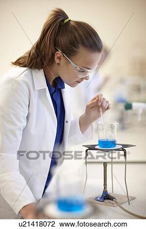 Student working in chemistry lab View Large Photo Image Stock Image - Student working in chemistry lab. Fotosearch