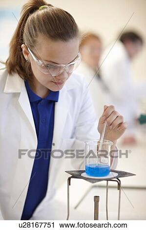 Student working in chemistry lab View Large Photo Image Stock Image - Student working in chemistry lab. Fotosearch