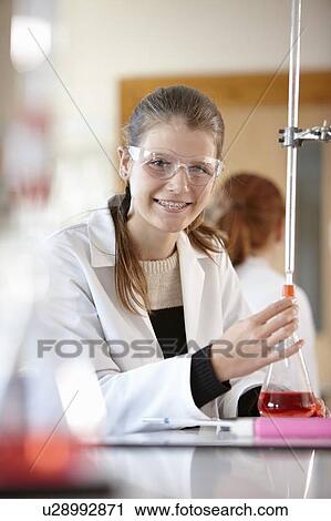 Student working in chemistry lab View Large Photo Image Stock Image - Student working in chemistry lab. Fotosearch