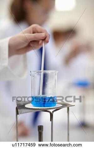 Student working in chemistry lab View Large Photo Image Stock Photo - Student working in chemistry lab. Fotosearch