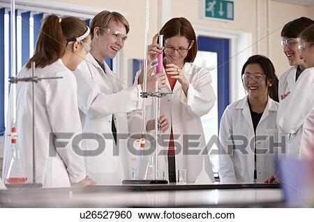 Students and teacher in chemistry lab View Large Photo Image Stock Image - Students and teacher in chemistry lab. Fotosearch