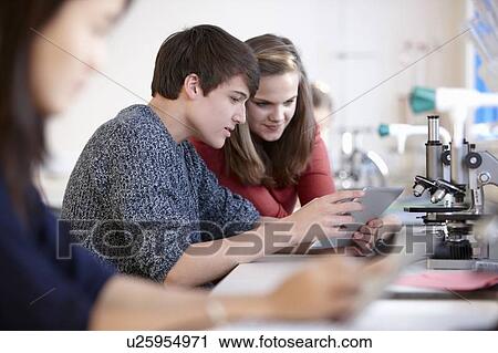 Students using tablet computer in class View Large Photo Image Stock Image - Students using tablet computer in class. Fotosearch