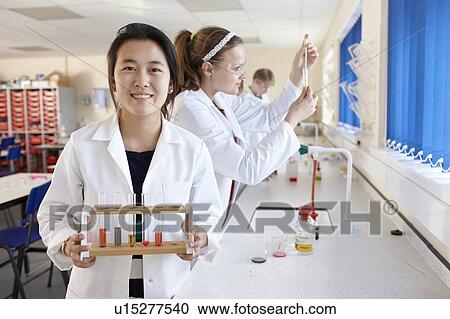 Students working in chemistry lab View Large Photo Image Stock Image - Students working in chemistry lab. Fotosearch