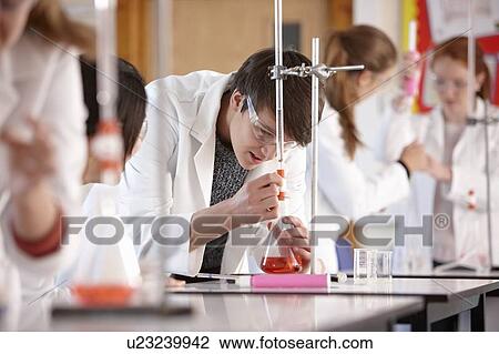 Students working in chemistry lab View Large Photo Image Stock Image - Students working in chemistry lab. Fotosearch