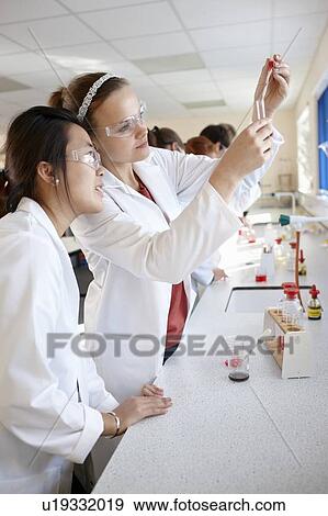 Stock Photo - Students working in chemistry lab. Fotosearch