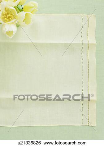 Stock Photograph - Table cloth with vase of tulips. Fotosearch